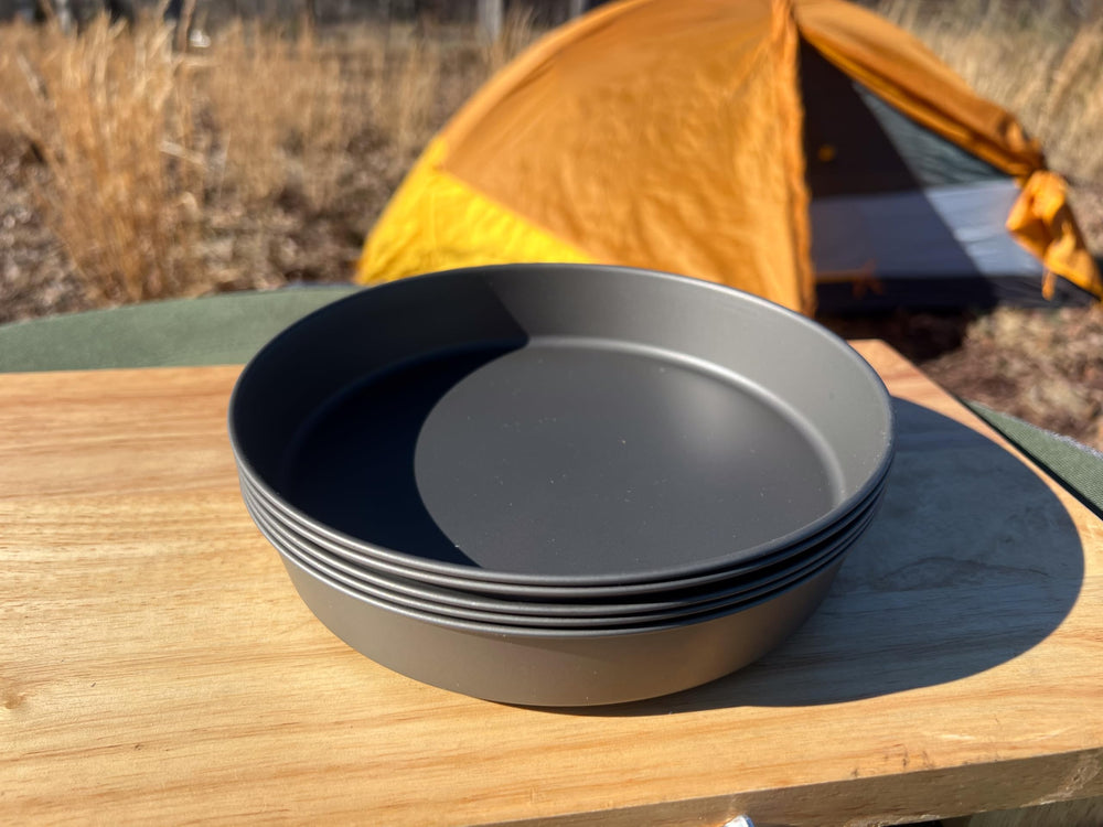 TOAKS Titanium D6.5 plate, lightweight design ideal for travel.