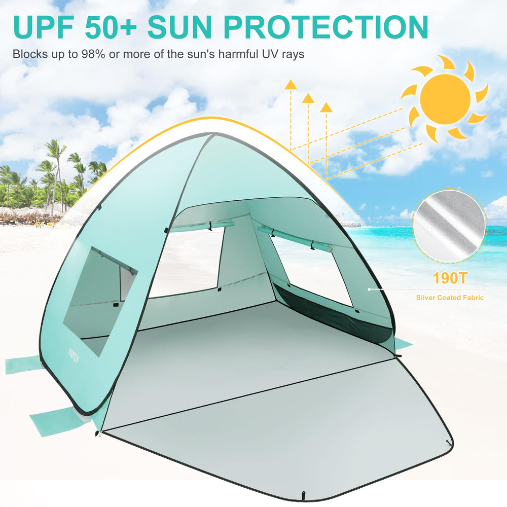 TOBTOS windproof beach tent with sandbags and pegs for stability.
