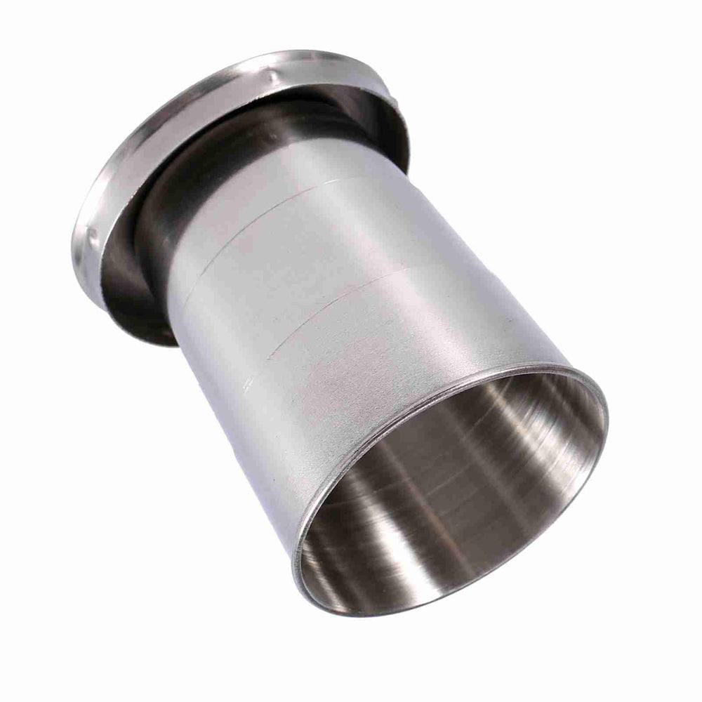 Tomedny collapsible cup on a desk with juice for convenient sipping.