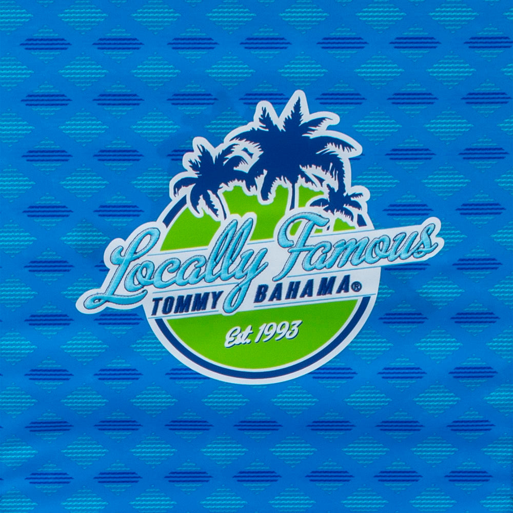 Tommy Bahama beach chair set at the shore highlights versatile outdoor seating.