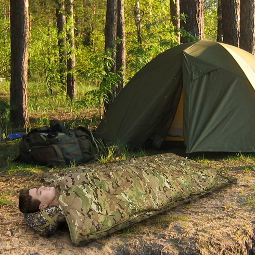 Tongcamo Poncho Liner Camouflage Pattern blends into outdoor environments.