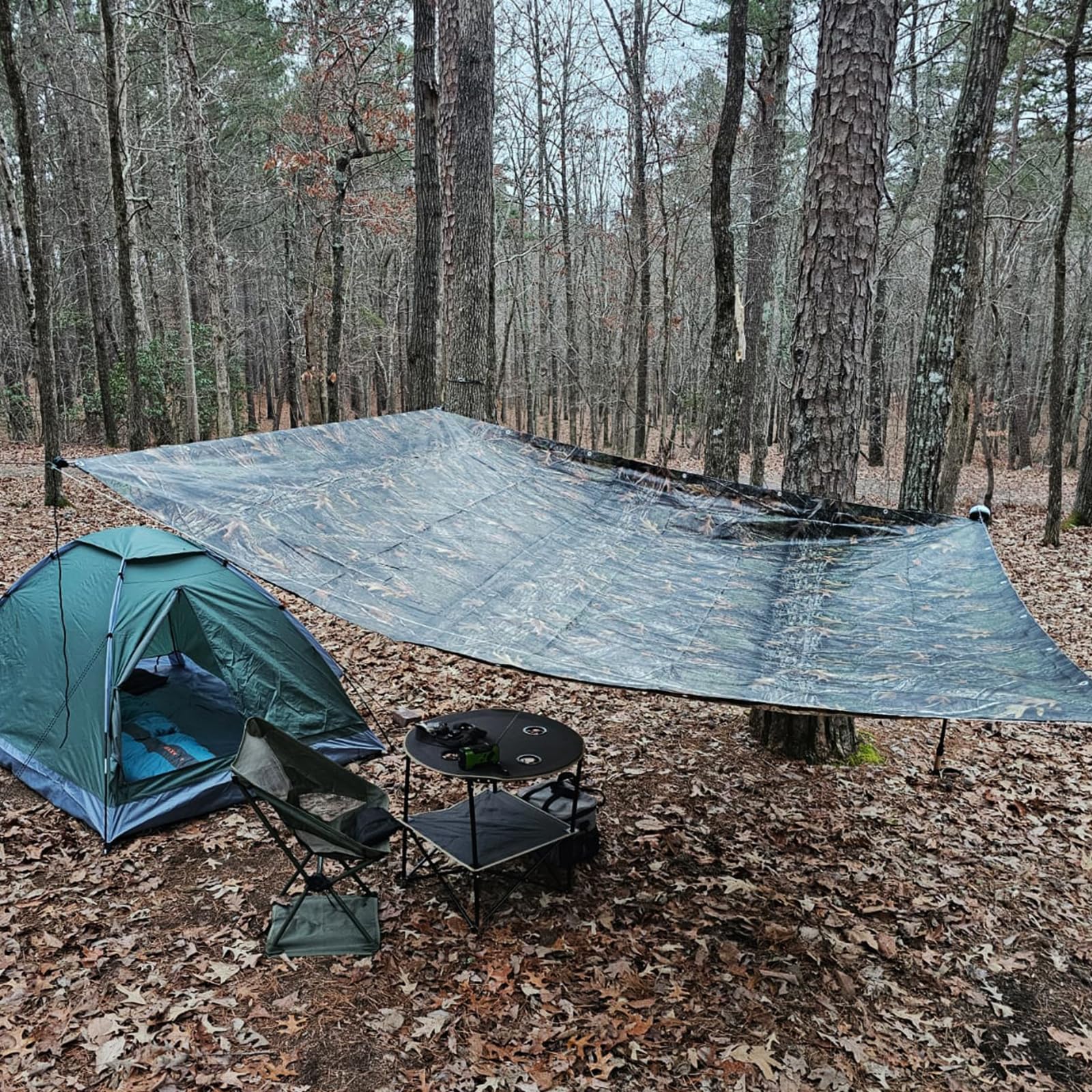 Tongcamo tarp with reinforced corner grommets for durable tie-downs.