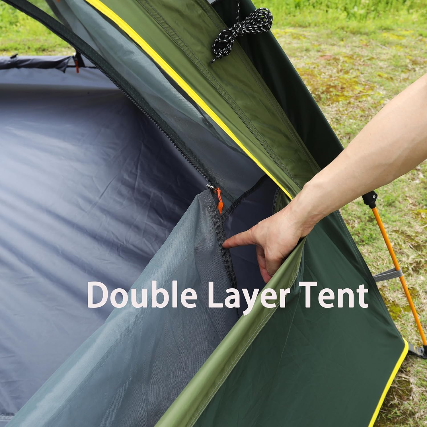Toogh tent vestibule created by two door poles for gear storage