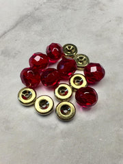 Close-up: Brass Top Brass Carolina Tickers with red 8mm glass beads