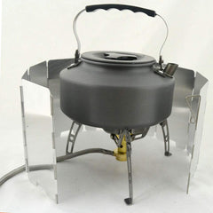Adjustable plates configuration fits different stove sizes for versatile outdoor cooking