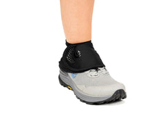 Topo Athletic performance gaiter attachment system secures quickly on rugged trails.