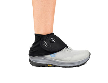 Topo Athletic performance gaiter secure fit 3-hook system maintains stability during runs.