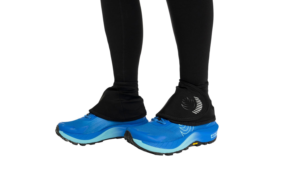 Topo Athletic Switchback Gaiter secures to heel for debris protection on rugged trails