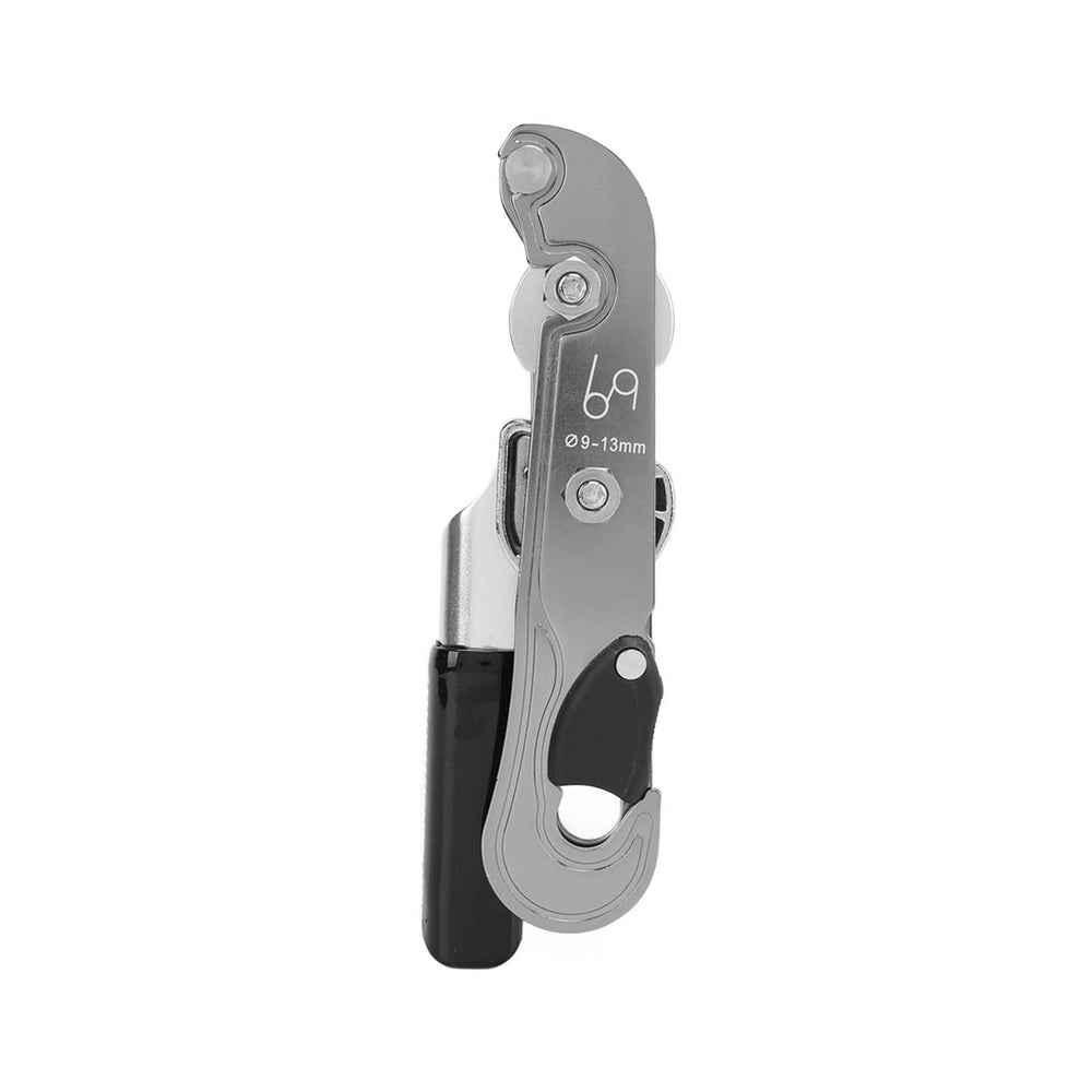 Topyond descender side plate open for quick rope setup during climbs.