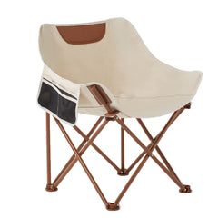 TOSAMC camping chair folded beside a backpack for travel-ready portability.