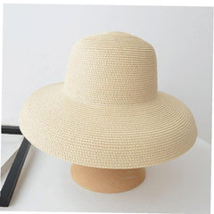 TOSSPER bow-pattern straw hat adds casual chic to outdoor outfits.