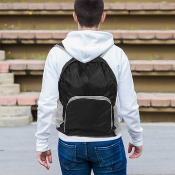 Totority compact folded backpack easy to carry in your day bag.