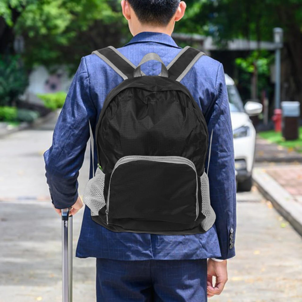 Totority weather-resistant backpack protects gear during outdoor adventures.