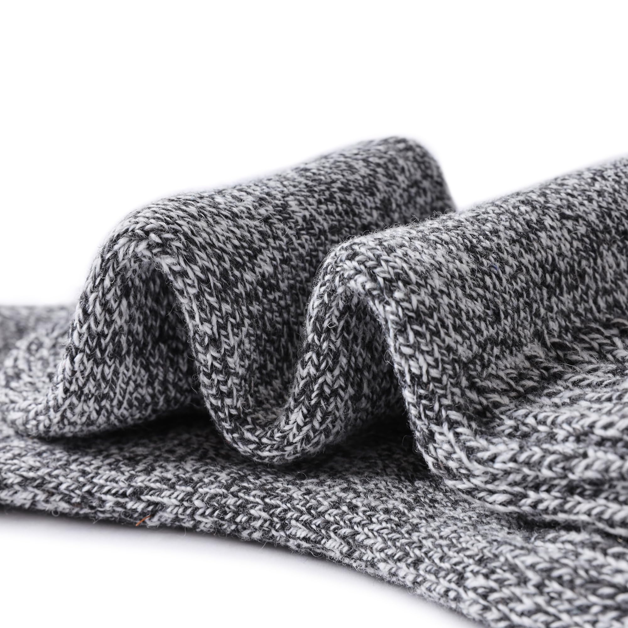 Tough Land Merino Wool Socks in winter setting emphasizing warmth and coziness
