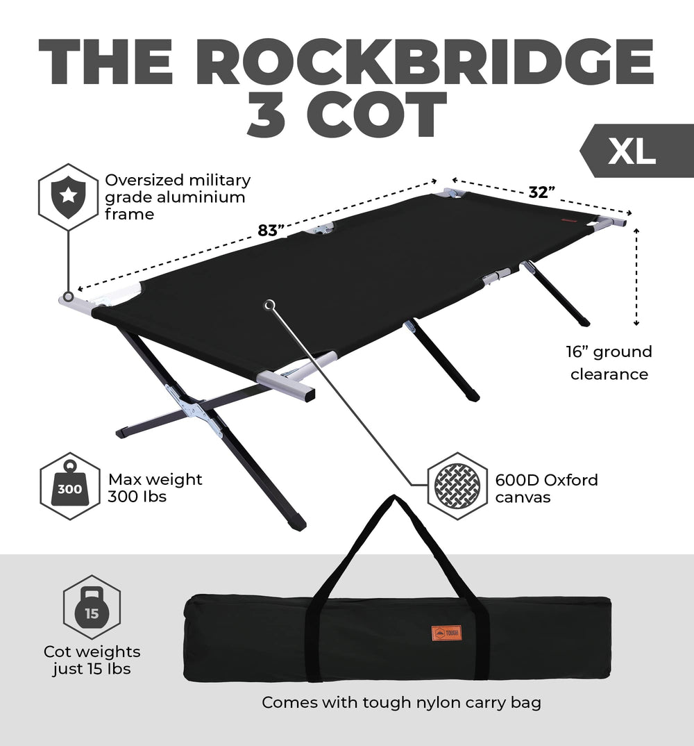 Tough Outdoors Evergreen camping cot in use beside campsite bed shows roomy sleeping area.