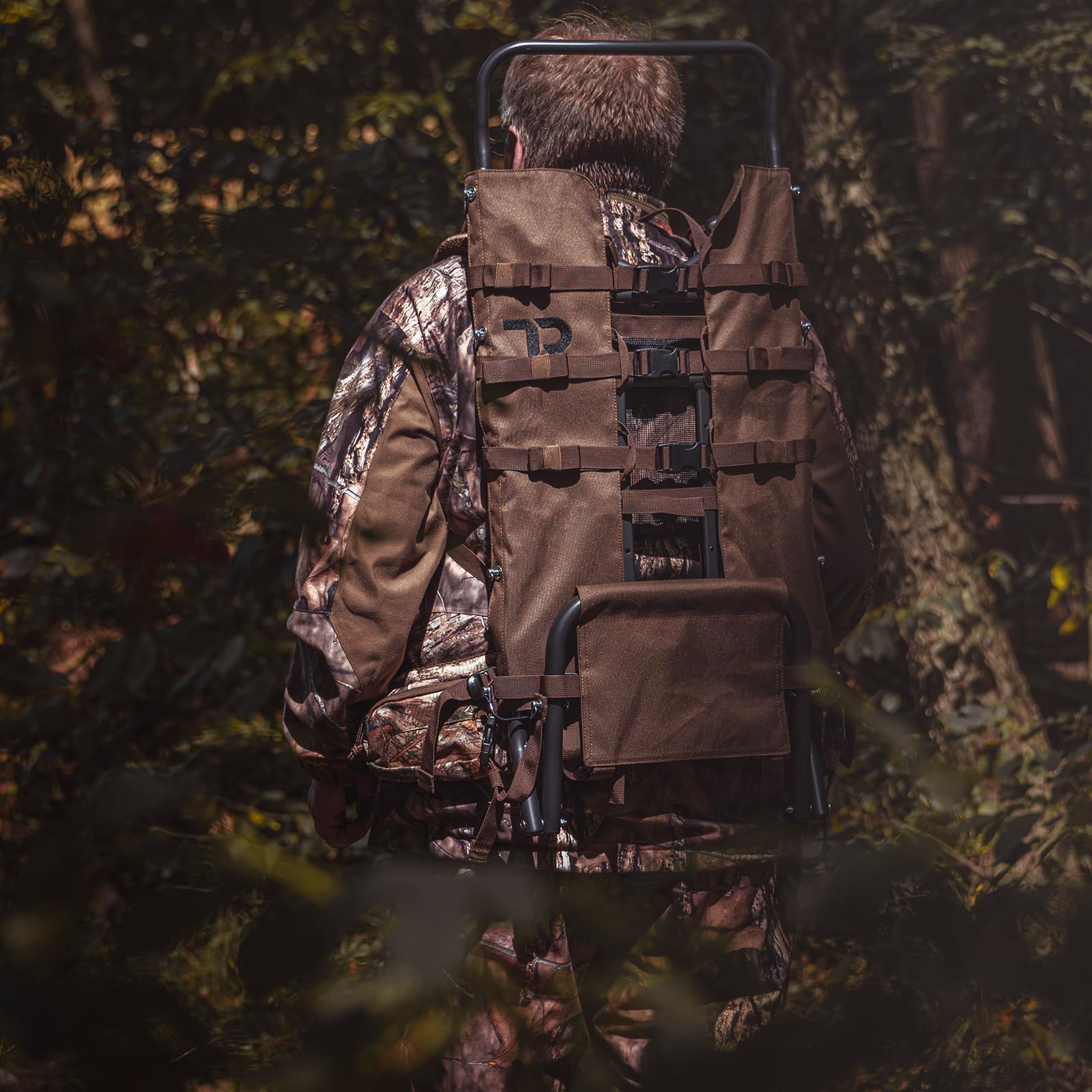 TR aluminum external frame backpack adjustable height shows top frame extending from 34 to 40 inches.