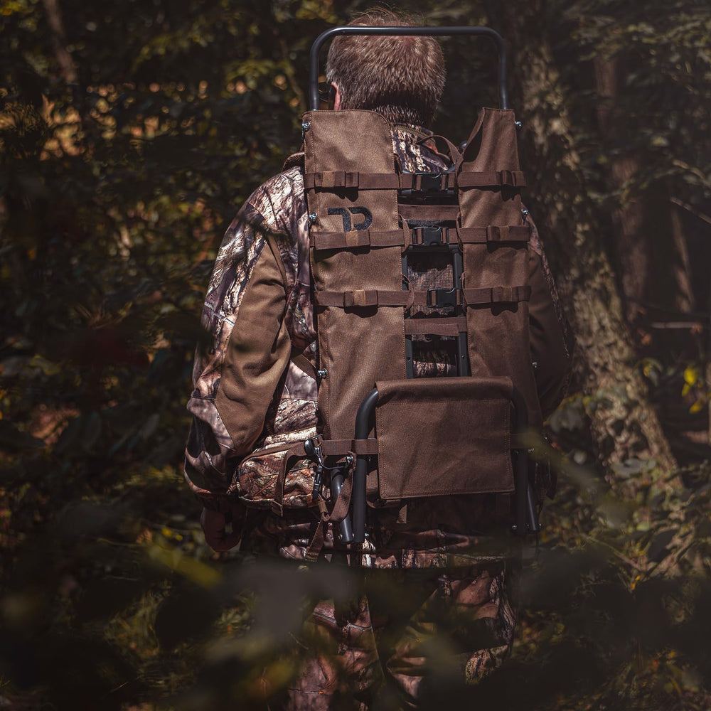 TR aluminum external frame backpack adjustable height shows top frame extending from 34 to 40 inches.