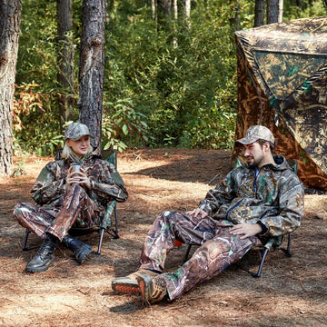 TR low camping chair camo folded in a carry bag for easy transport.