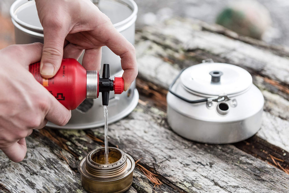 Trangia fuel bottle safety cap pour design allows pouring without cap removal