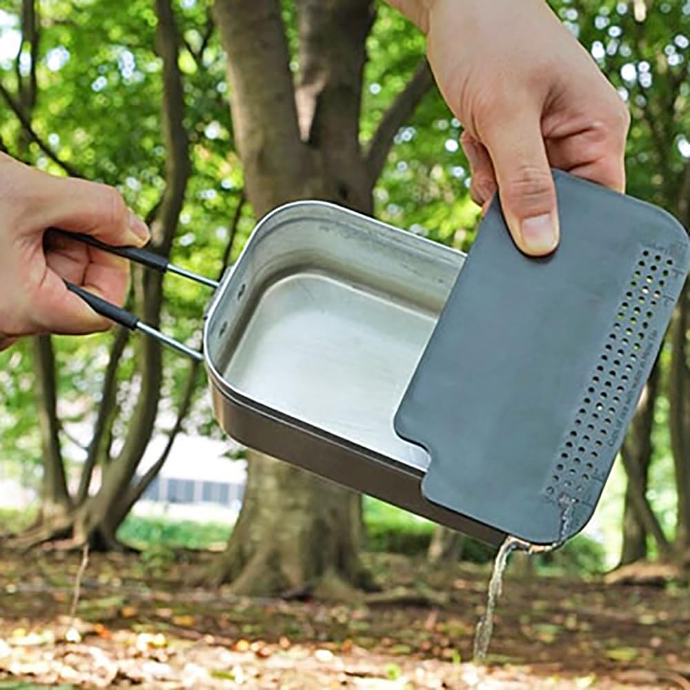Trangia Multiboard gray with Mestin for compact camp kitchen workspace.