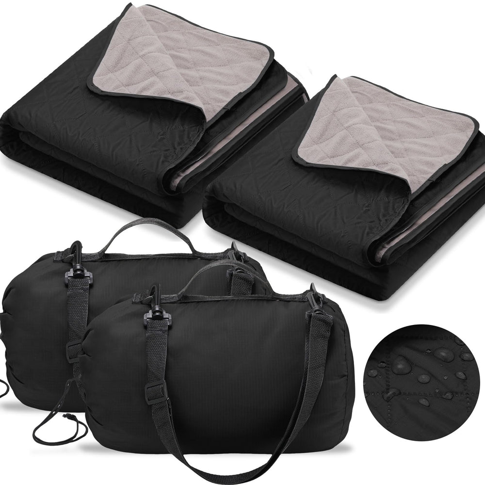 Tranqun outdoor blanket folded in black shows compact warmth for travel