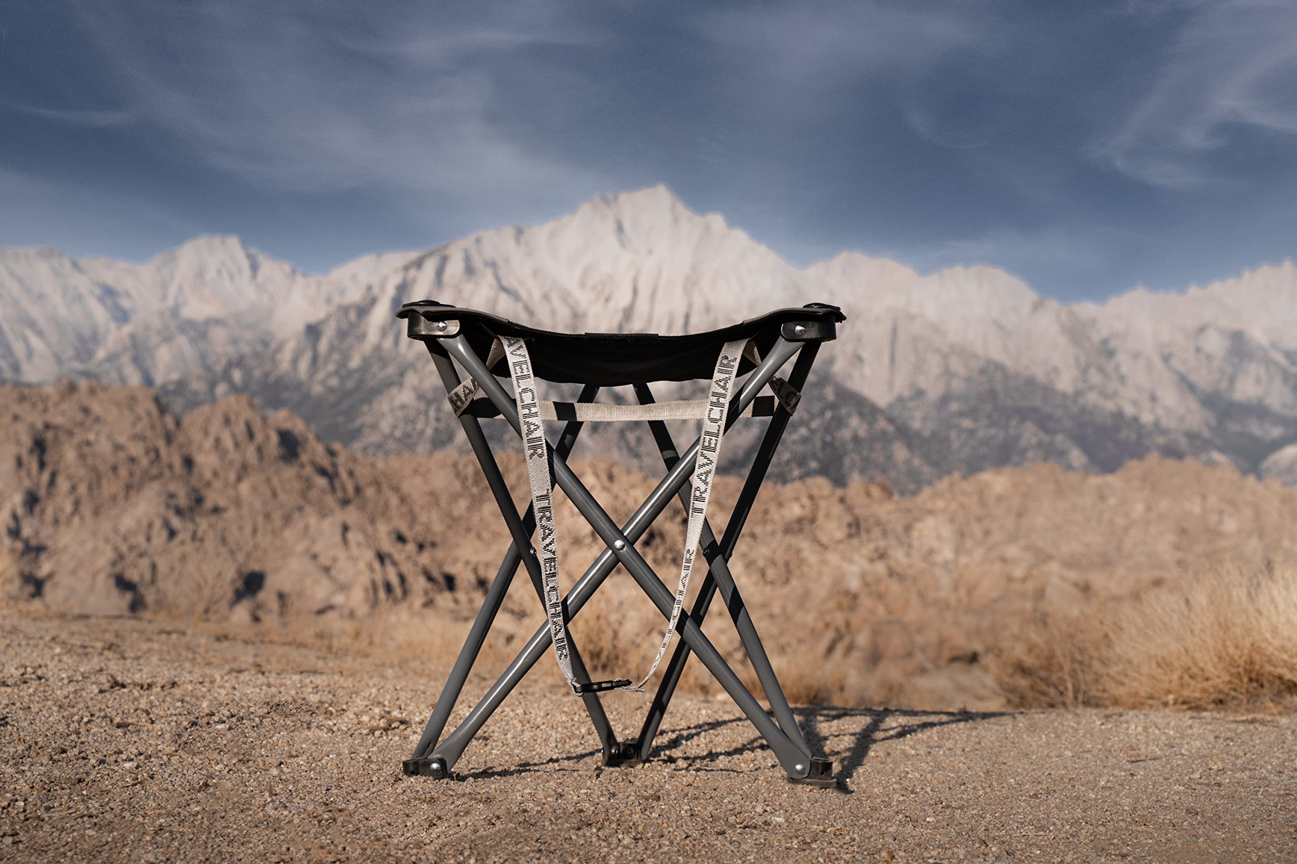 Travel Chair Big Slacker Stool open tripod ready for outdoor seating.