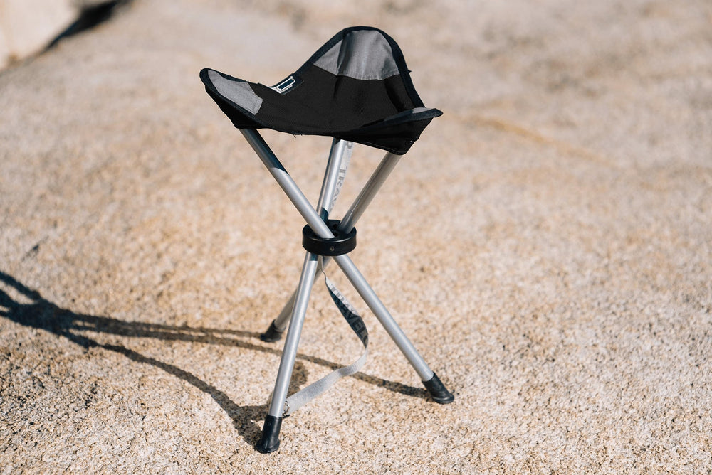 Travel Chair Slacker Tripod Chair opened for stable, comfortable camping seating.