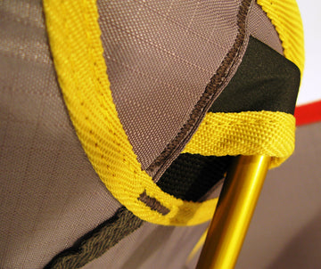 Travel Chair Joey yellow color enhances visibility and outdoor style.