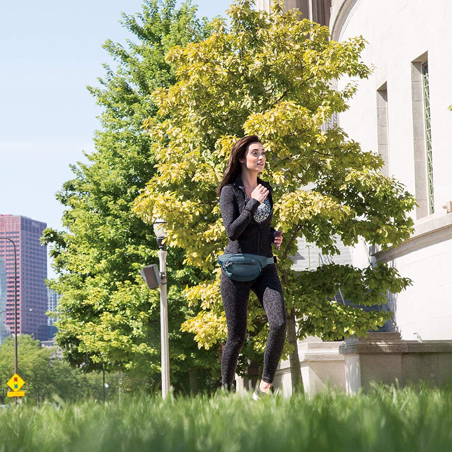 Travelon Anti-Theft Active Waist Pack showing 5-Point security system for safer carry.