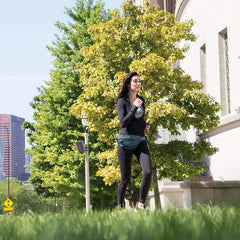 Travelon Anti-Theft Active Waist Pack showing 5-Point security system for safer carry.