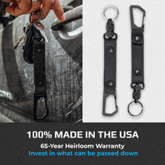 Trayvax stealth black leather keychain attached to backpack for easy reach