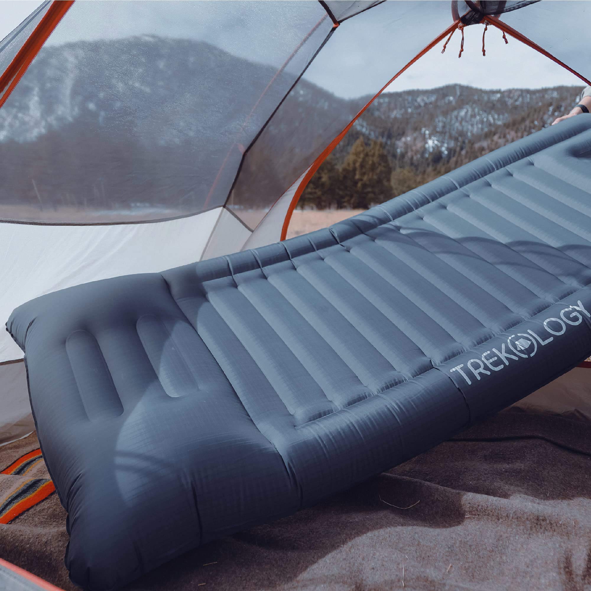 TREKOLOGY sleeping pad with 40D nylon and water-resistant coating.