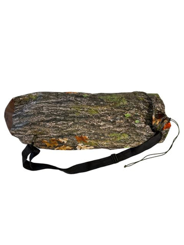 Treow Outdoors Cocoon Hammock in Treow camo blends with trees for concealment.