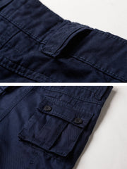 TRGPSG women's camouflage cargo pants side pocket open for easy access during activity.