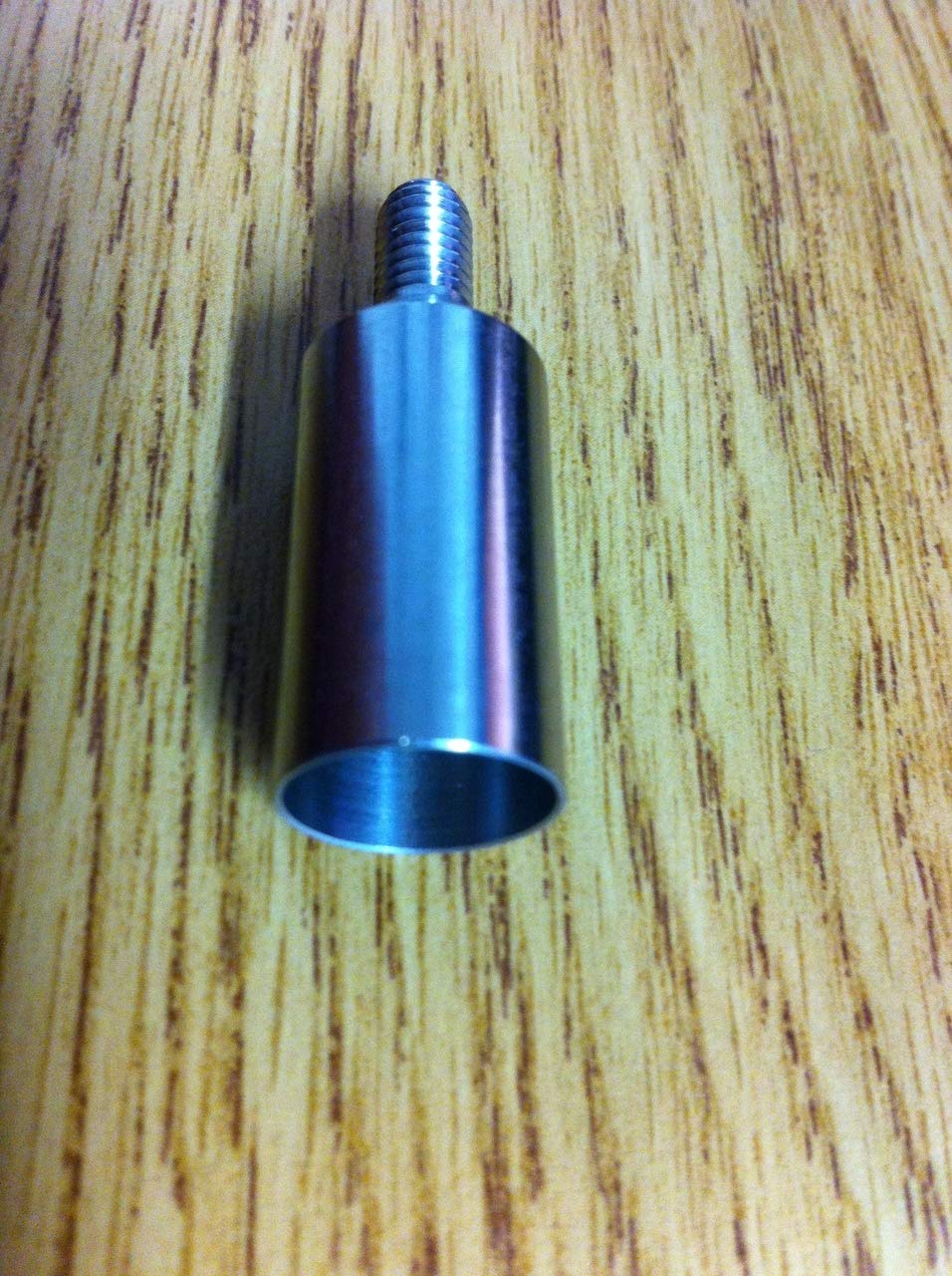 Trident spearpoint adapter stainless steel detail enables secure replacement tip on a pole.