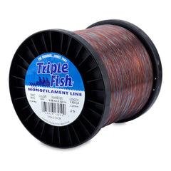 Triple Fish monofilament spool closeup shows smooth knots for reliable fishing.