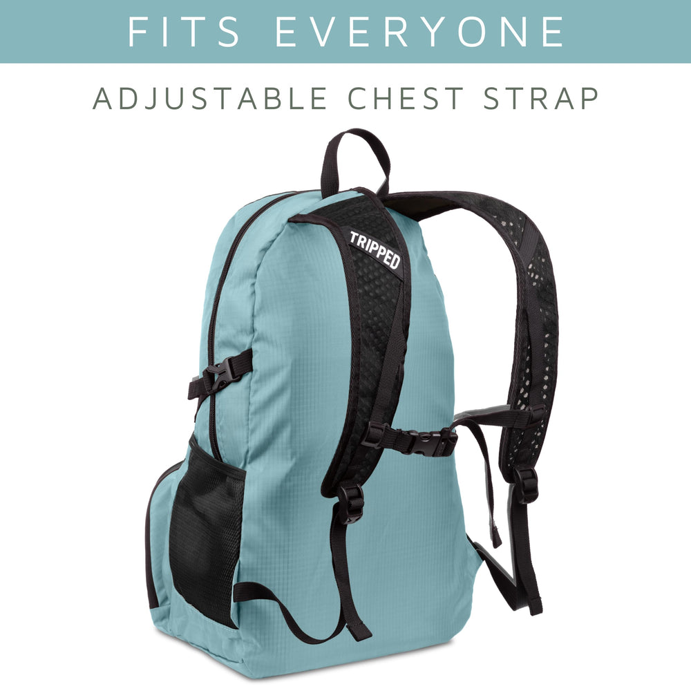 TRIPPED Travel Gear teal foldable backpack 35L capacity suits day trips and weekend getaways.