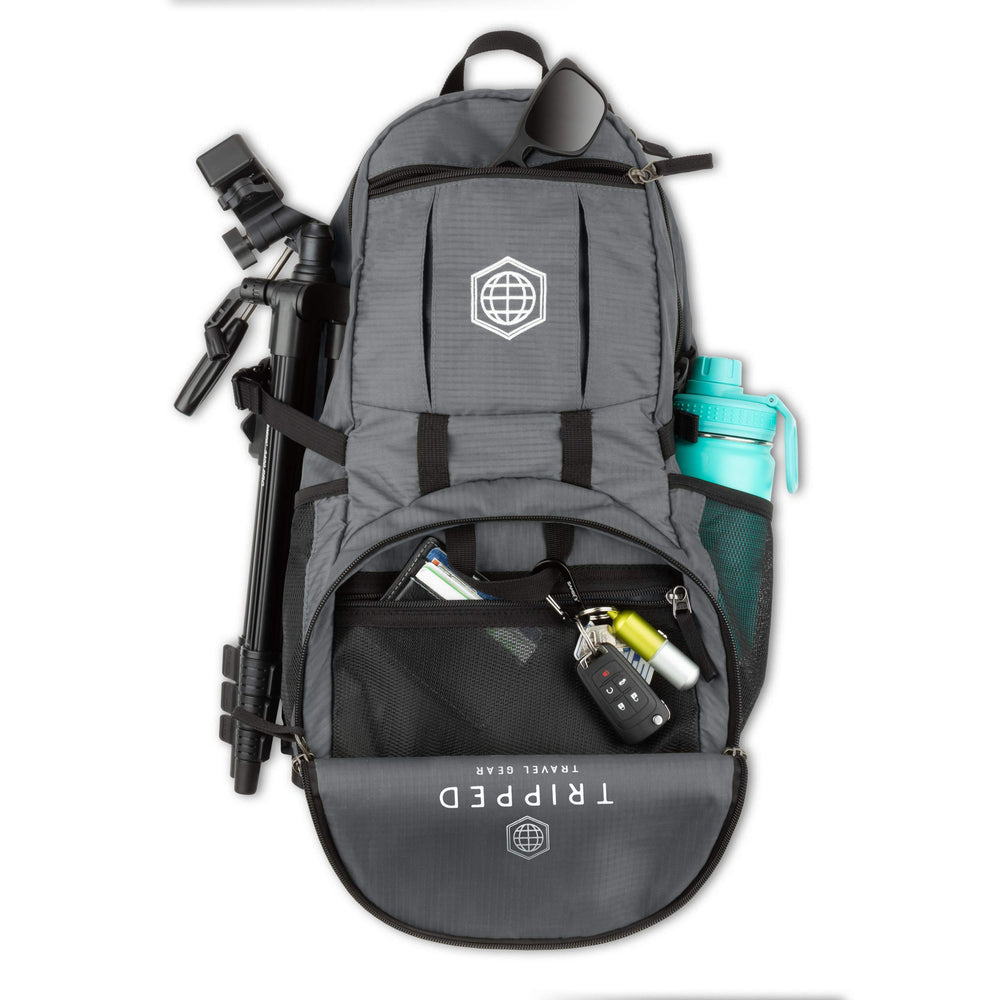 TRIPPED Granite Grey 35L Backpack multiple pockets organize keys, passport, and sunglasses