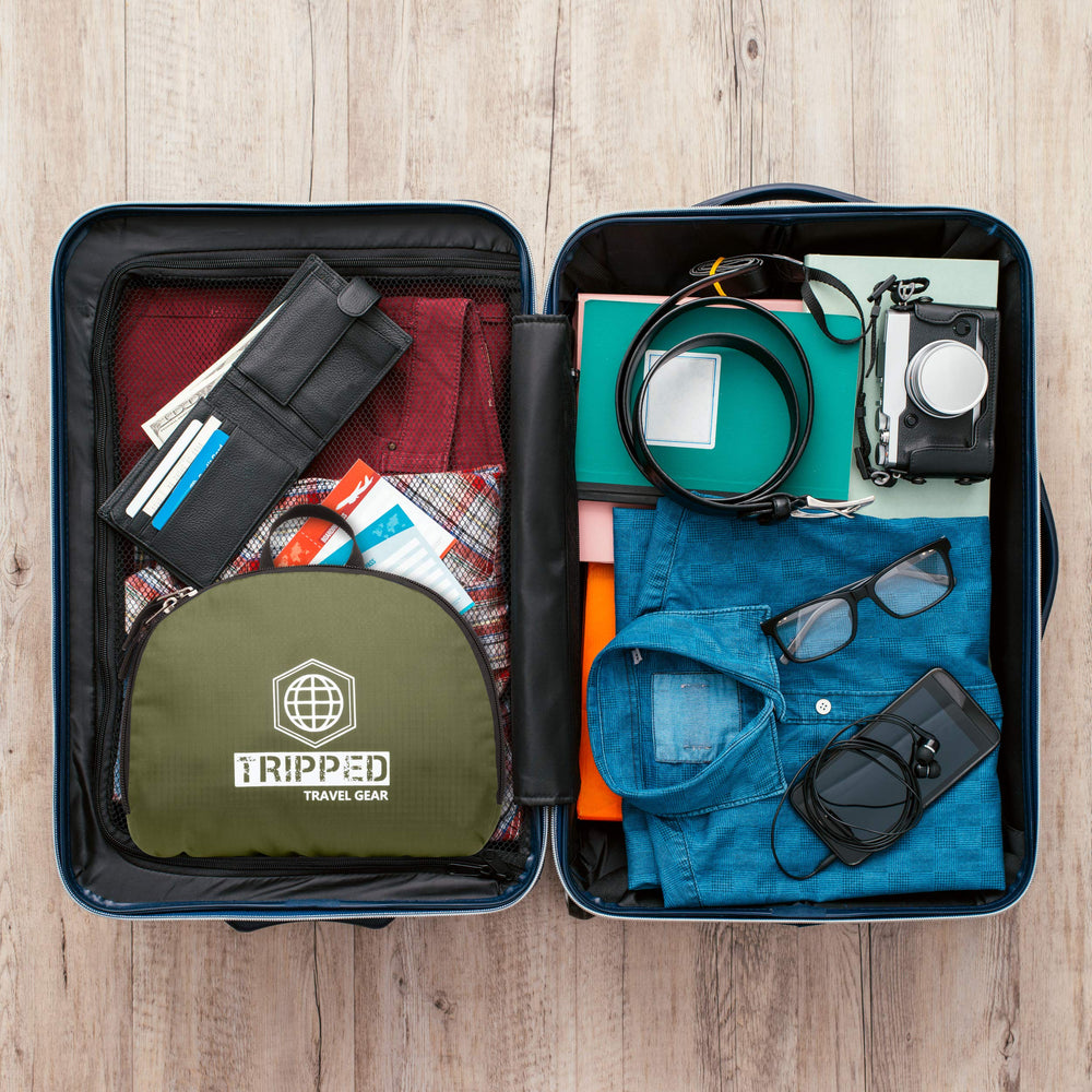 TRIPPED Travel Gear back panel and luggage strap view highlights versatile travel compatibility