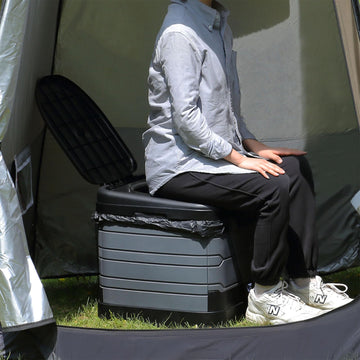 TRIPTIPS portable potty open-ready with wider seat for comfortable use on trips.