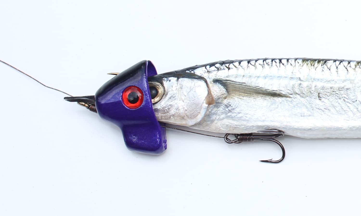 TrollTrue razor-sharp treble hooks on rig highlight long-lasting sharpness.