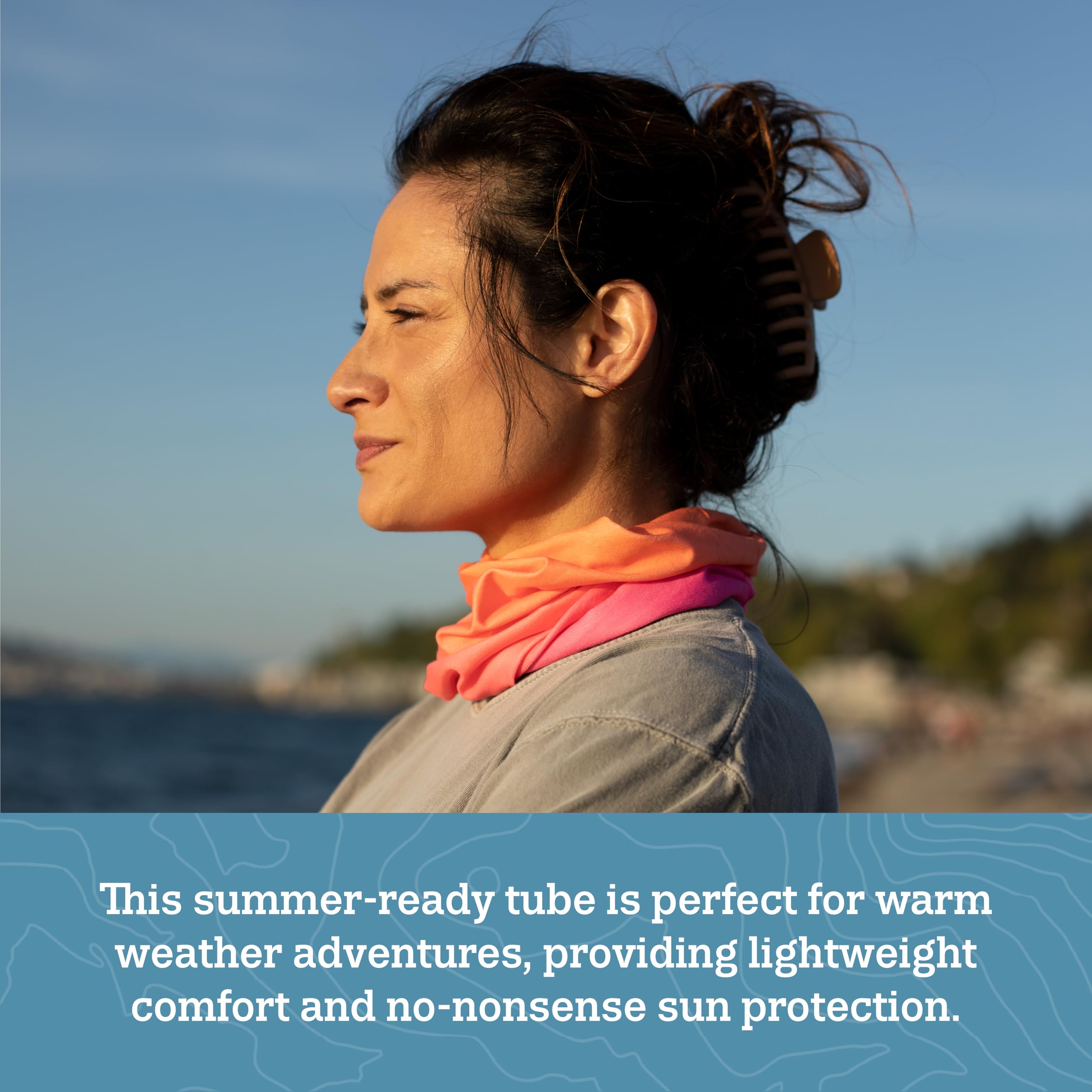 Turtle Fur Comfort Shade Tube UPF 50+ Seafoam blocks sun rays during outdoor activities.