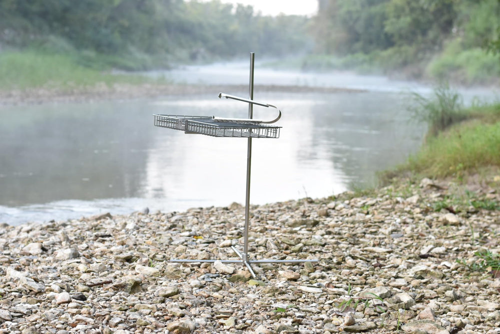 Tyrux grill on a portable tabletop at the campsite