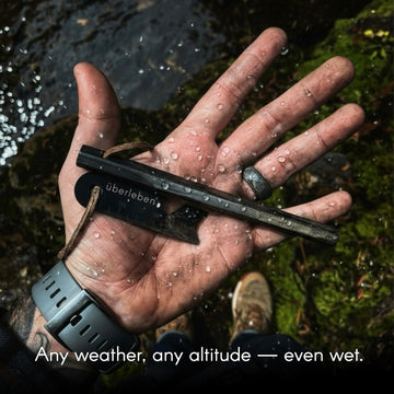 Uberleben Hexao Original fire starter with paracord lanyard for secure carry on trails
