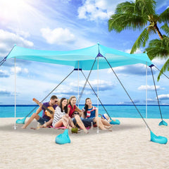 Uboway Beach Tent 10x10 turquoise in use, spacious shade for family beach day.