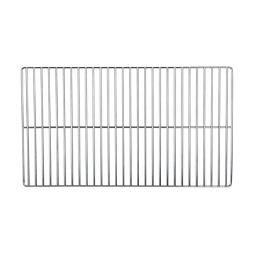 UCO Flatpack at beach or picnic providing smokeless warmth and grill capability