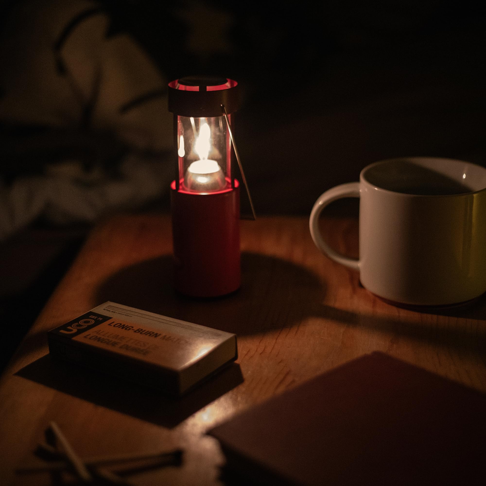 UCO Original Candle Lantern portable with carrying handle and hook for versatile placement.