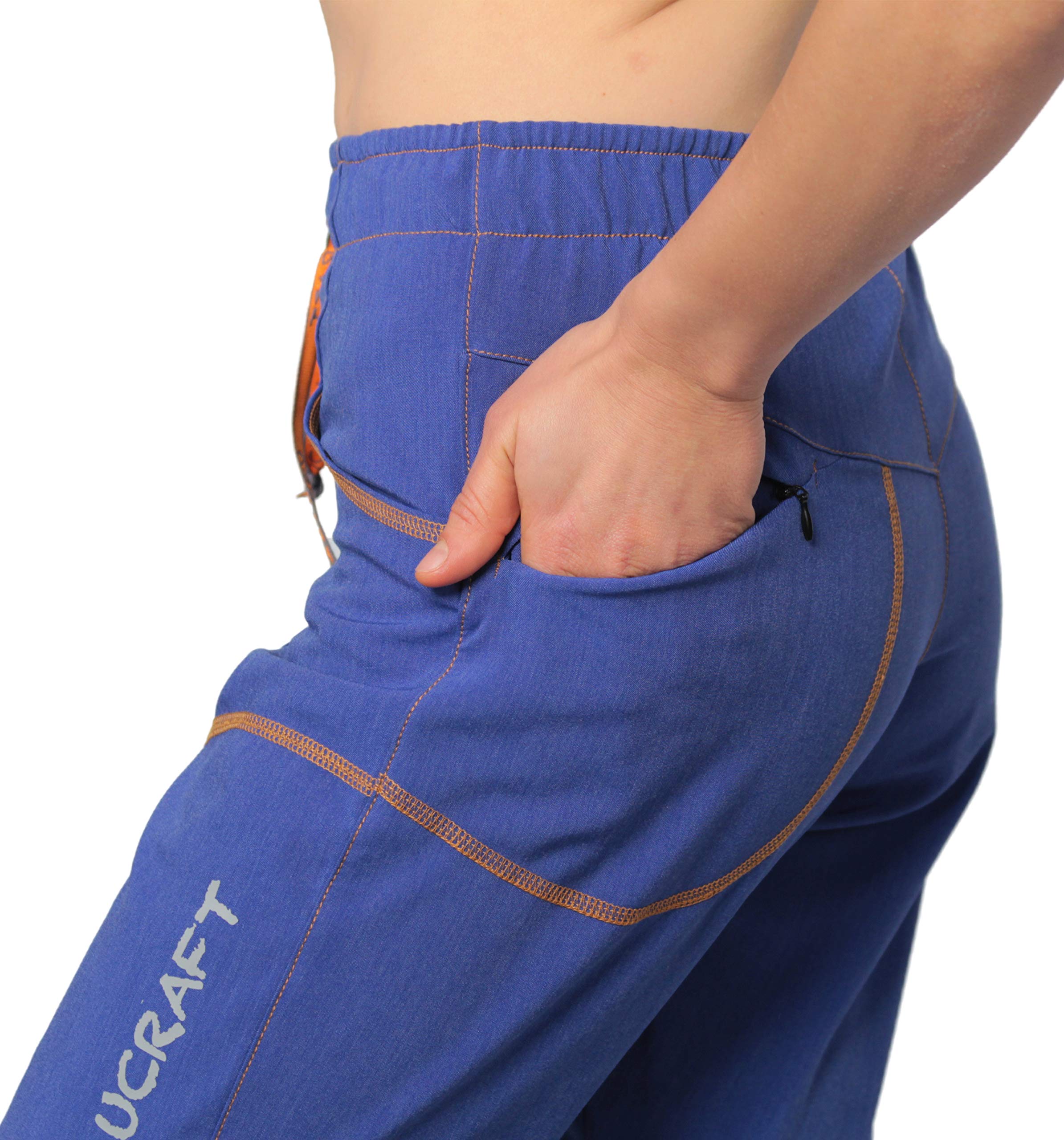 Ucraft Xlite model wearing pants during light yoga and bouldering outdoors