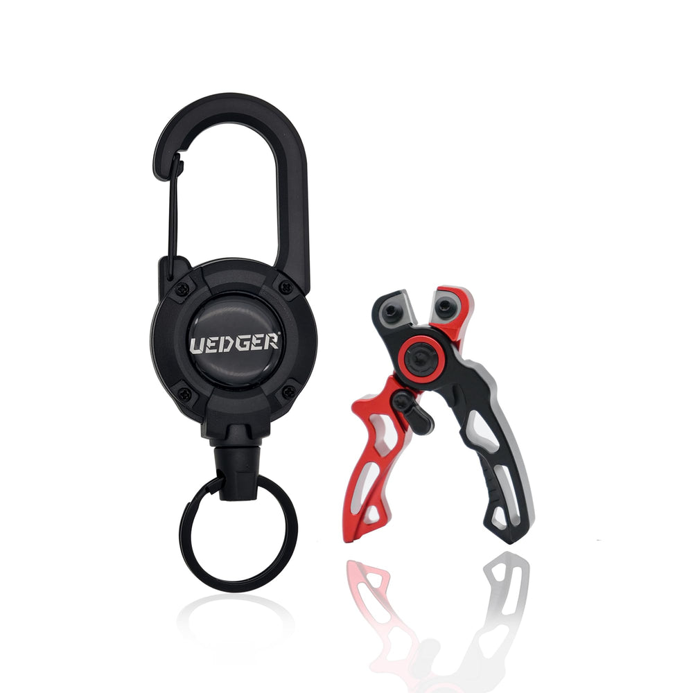 Red UEDGER fishing line scissors in use on fishing setup