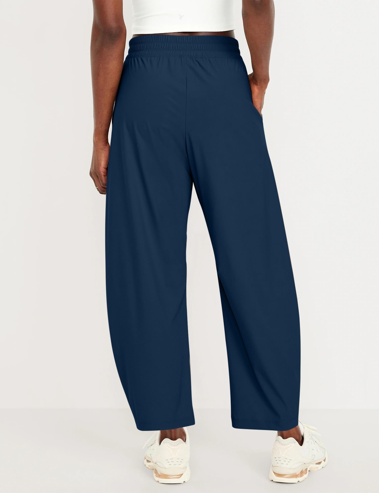 Ugerlov barrel ankle pants blue side view highlights four-way stretch for mobility.
